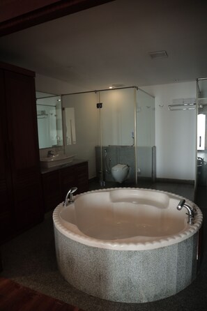 Executive Double Room | Bathroom | Separate tub and shower, deep soaking tub, towels, soap - By The Bay Kovalam (Kovalam)