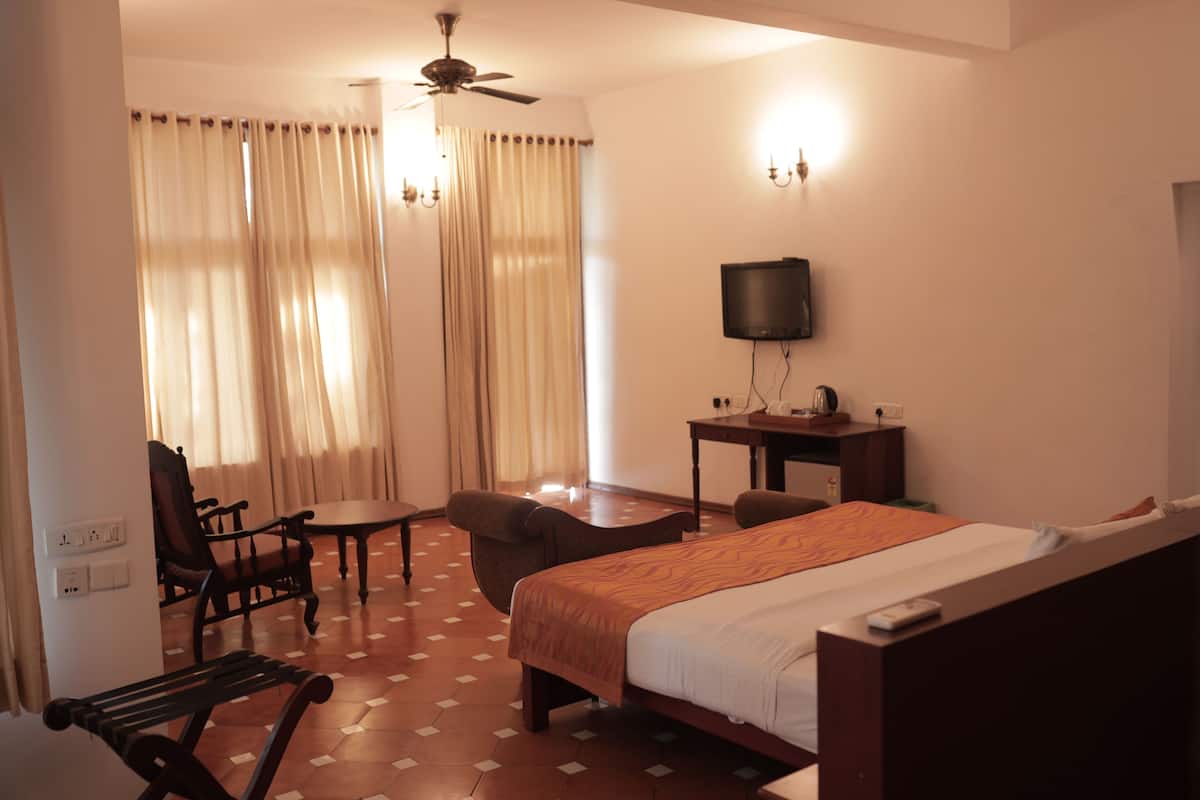 Deluxe Room, Balcony, Sea View | In-room safe, desk, laptop workspace, blackout drapes