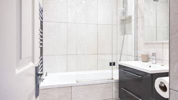 Hair dryer, towels, soap, shampoo