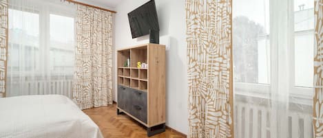 2 habitaciones, tabla de planchar con plancha, cuna de viaje y wifi