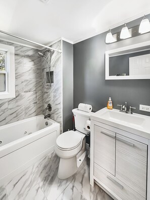 Hair dryer, towels, soap, toilet paper