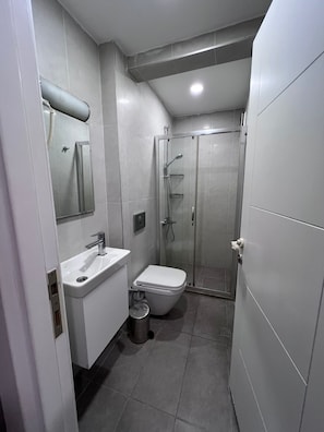 Hair dryer, towels, toilet paper