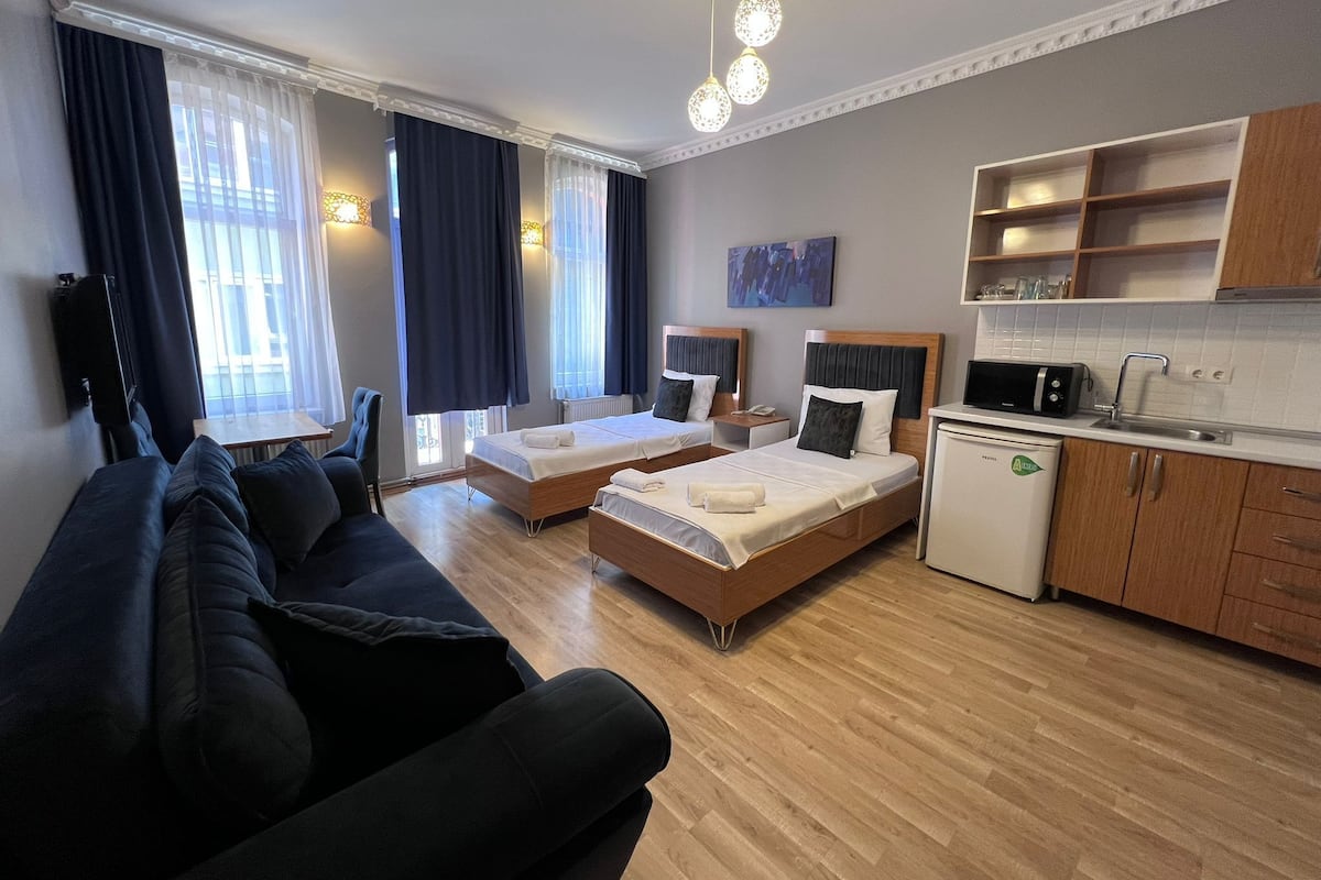 Habitación triple Deluxe | Escritorio y wifi gratis