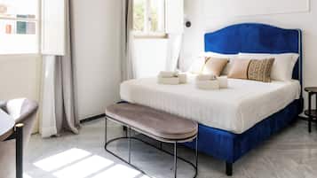 Deluxe Suite, Balcony, City View | In-room safe, laptop workspace, blackout curtains, soundproofing