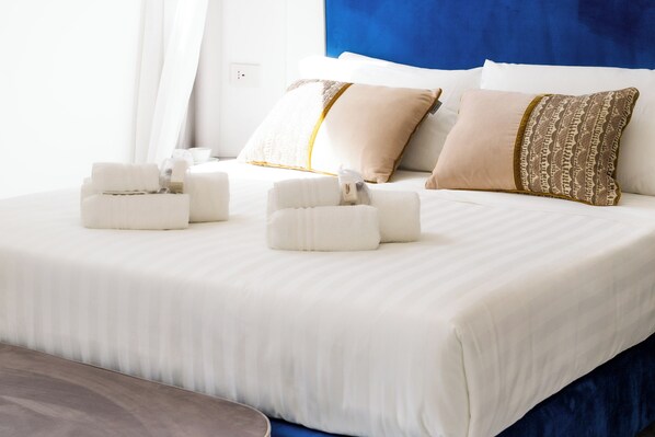 Deluxe Suite, Balcony, City View | In-room safe, laptop workspace, blackout drapes, soundproofing