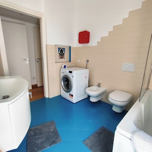 Hair dryer, bidet, towels, soap