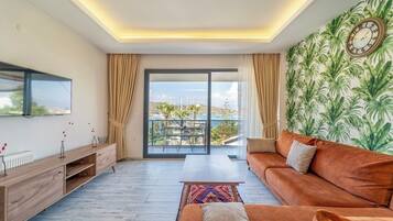 50 インチのスマートテレビ (ケーブル放送視聴可)