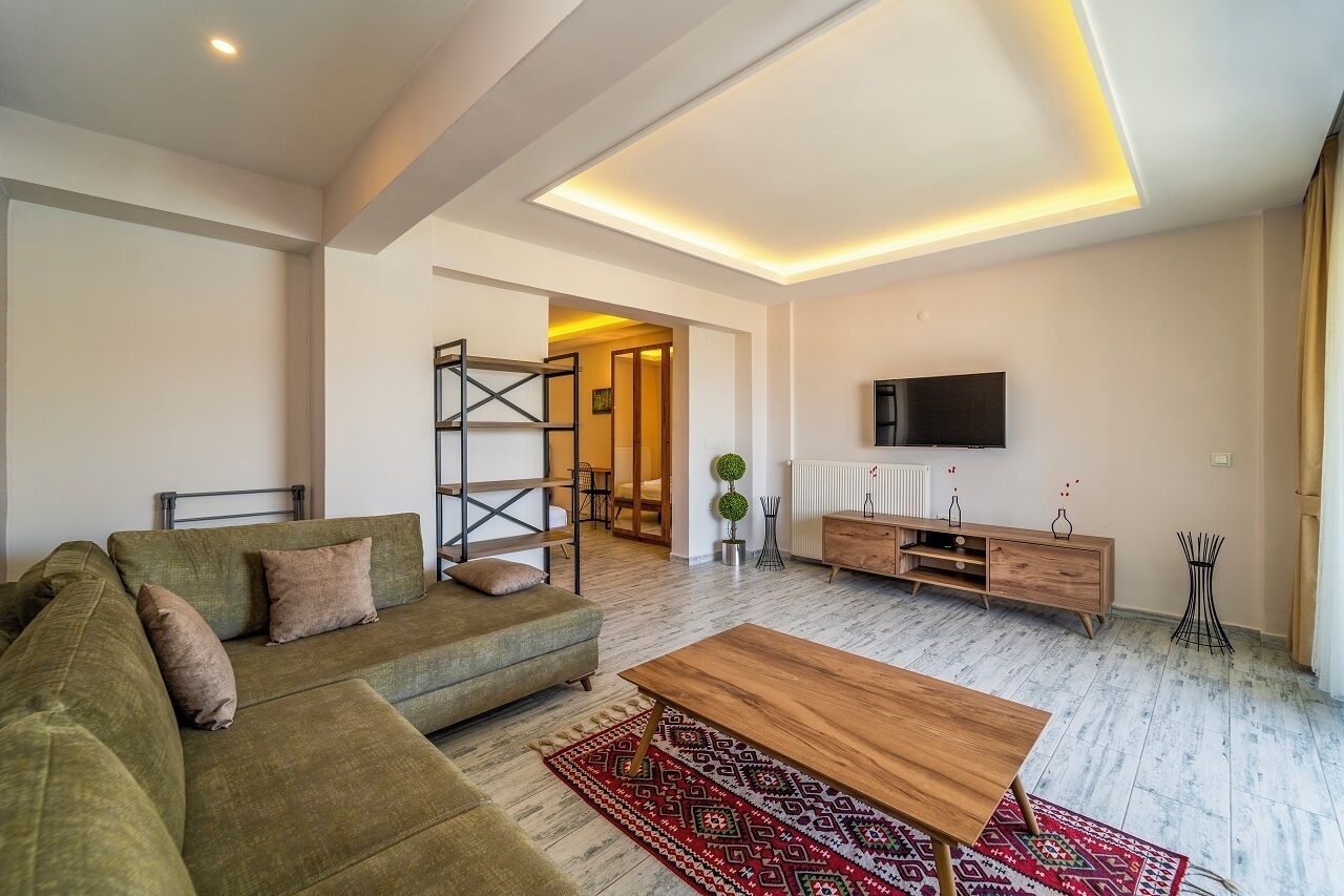 Standard-Suite, 1 Queen-Bett, Meerblick | Wohnbereich | 50-Zoll-Smart-TV mit Kabelempfang