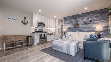 Suite ejecutiva | Área de sala de estar | Televisión