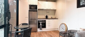 Perched on a peaceful ridge above the Tasman Sea, Luna Ridge Hokitika offers a modern yet cozy retreat.