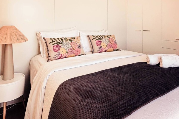 The bedroom - soft linens and peaceful hues for restorative nights.