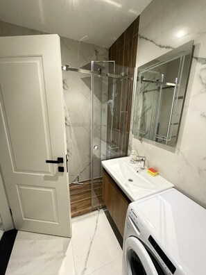 Hair dryer, bidet, towels, soap