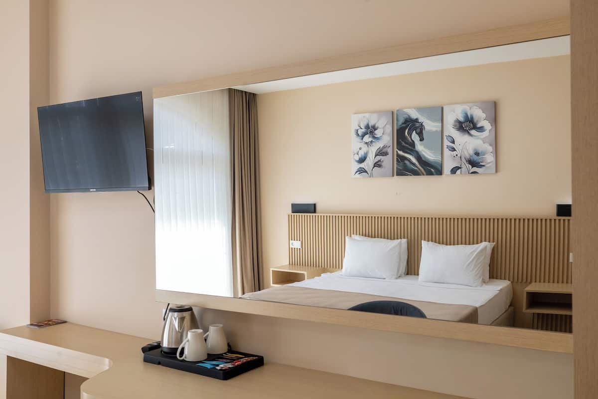 Desk, laptop workspace, free WiFi, bed sheets