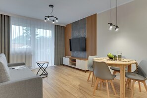 Lägenhet Deluxe - 2 sovrum - terrass | Vardagsrum | Platt-tv