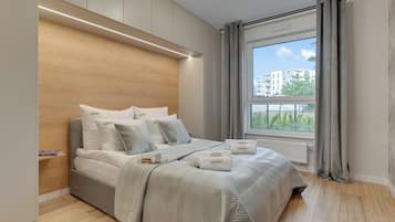 Appartamento Deluxe, 2 camere da letto, terrazzo | Area soggiorno | TV a schermo piatto