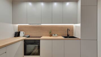 Appartamento Deluxe, 2 camere da letto, terrazzo | Angolo cottura privato | Frigorifero, forno, piano cottura, lavastoviglie