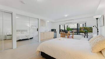 Iron/ironing board, travel crib, WiFi, bed sheets