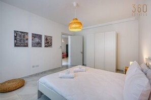 1 bedroom, desk, iron/ironing board, travel cot