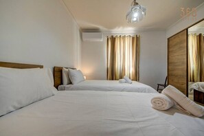 3 bedrooms, desk, iron/ironing board, travel cot