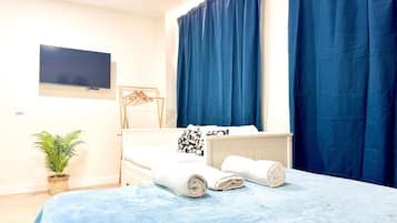 1 slaapkamer, een strijkplank/strijkijzer, internet, beddengoed