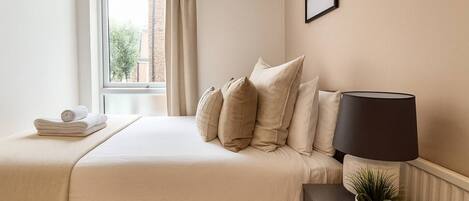 2 dormitorios, tabla de planchar con plancha, wifi y ropa de cama