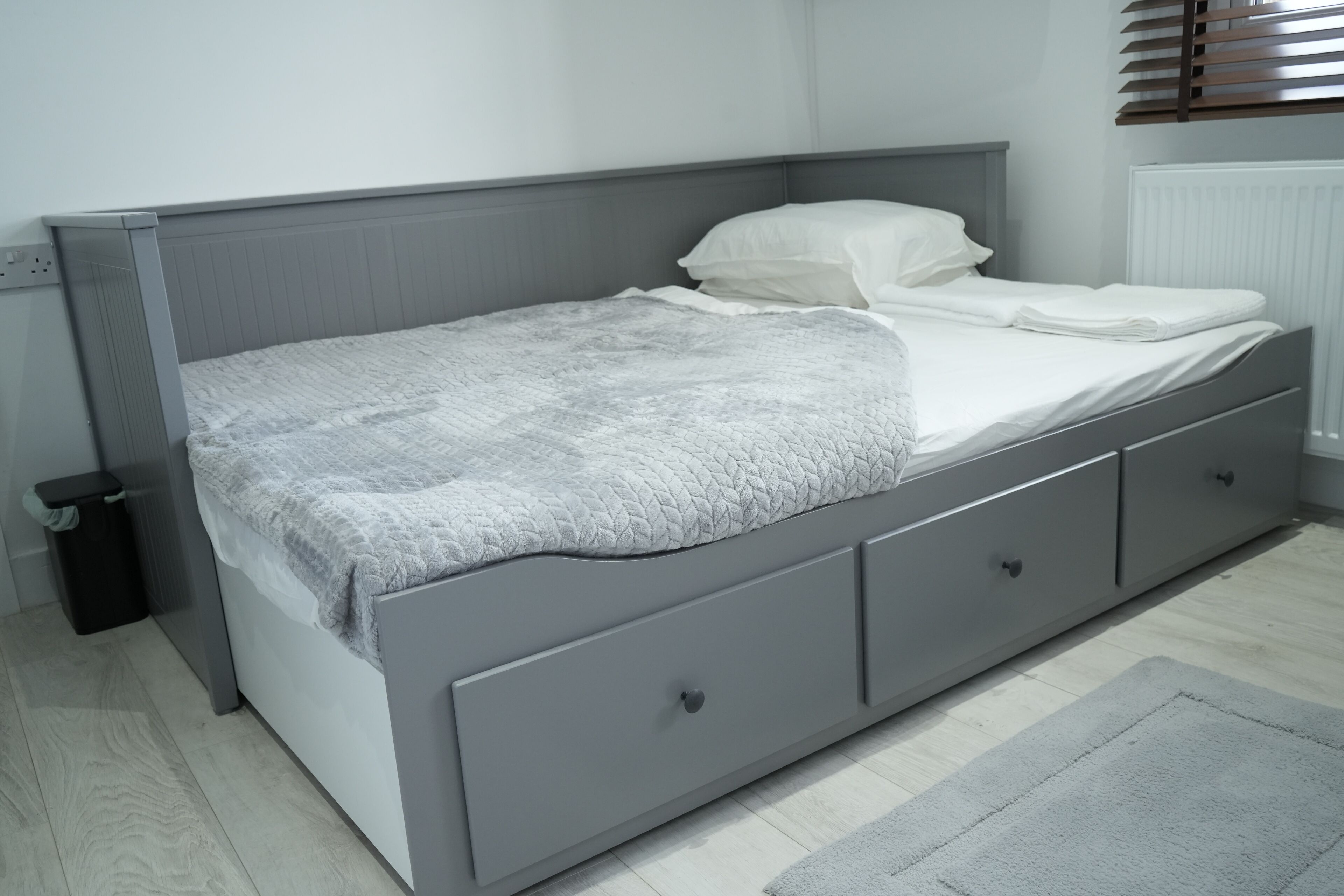 Premium bedding, desk, blackout drapes, soundproofing