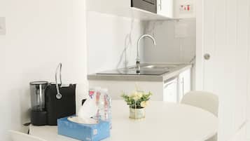 Estudi en suite Deluxe, 1 llit de matrimoni gran | Sala d'estar
