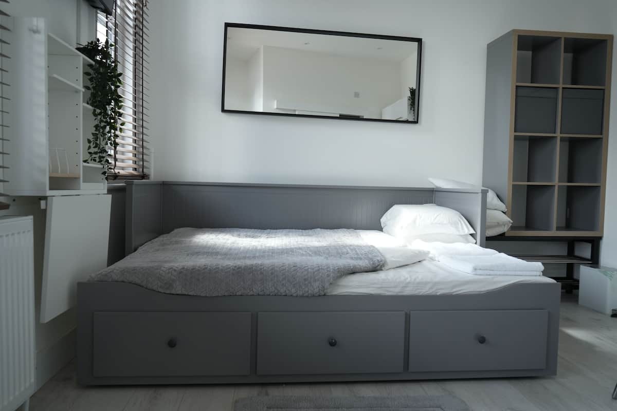 Premium bedding, desk, blackout curtains, soundproofing