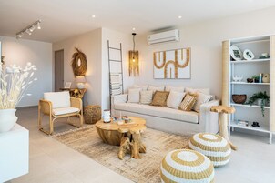 Apartment, Balcony, Lake View | Living room | 43-inch Smart TV with cable channels, streaming services