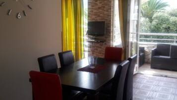 Apartment (Two Bedroom Apartment With Sea View () | Living room | 32-inch flat-screen TV with cable channels