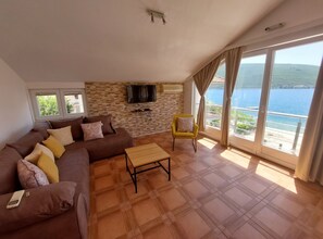 Apartment (Two Bedroom Apartment With Sea View () | Living room | 32-inch flat-screen TV with cable channels