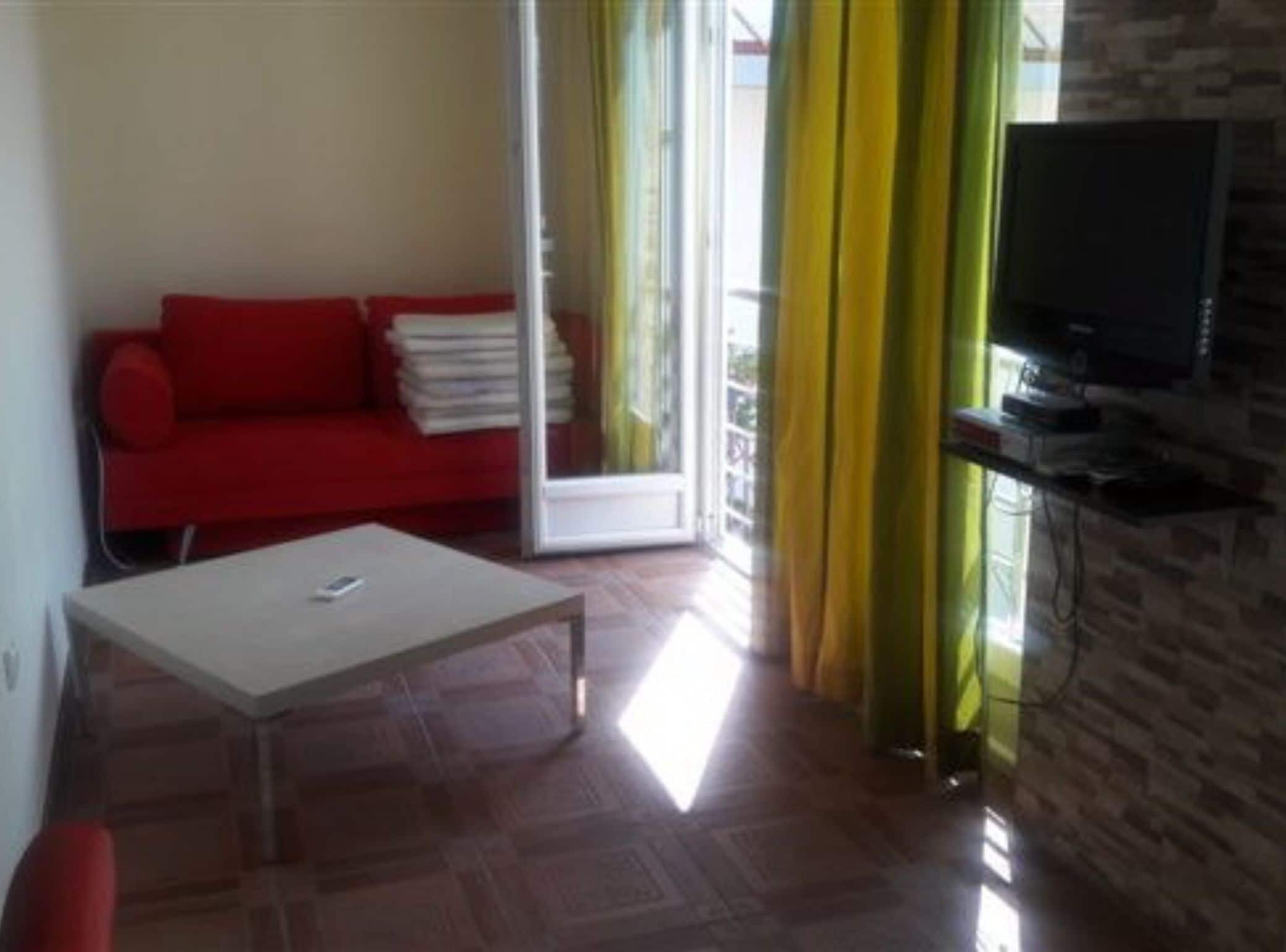 Apartment (Two Bedroom Apartment With Sea View () | Living room | 32-inch flat-screen TV with cable channels