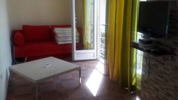 Apartment (Two Bedroom Apartment With Sea View () | Living room | 32-inch flat-screen TV with cable channels