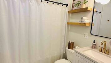 Hair dryer, towels, soap, toilet paper