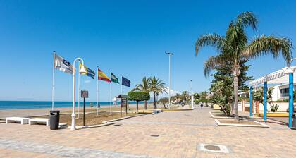 Holiday Home 'La Casa De La Cala Del Moral' with Shared Pool, Wi-Fi and Air Conditioning
