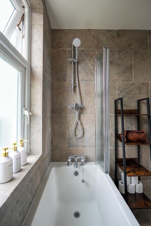 Eco-friendly toiletries, hair dryer, bidet, towels