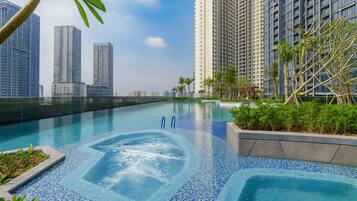 Family Apartment, 3 Bedrooms, Balcony, City View | Hypo-allergenic bedding, minibar, individually decorated