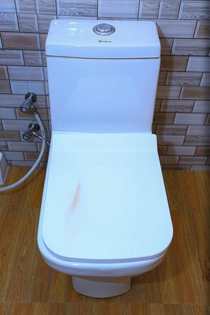Raised toilet seat