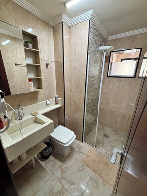 Hair dryer, towels, soap, shampoo