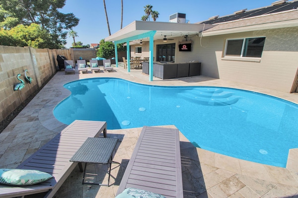 Dive into your private pool oasis with loungers, shade, and room to unwind.