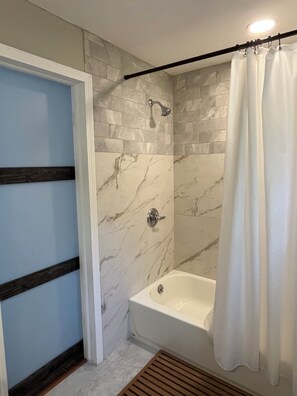 Shower, hair dryer, towels, soap