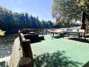 Outdoor dining - ADK Channel House - Spacious, waterfront home.  Huge boathouse with top sun deck (Old Forge)