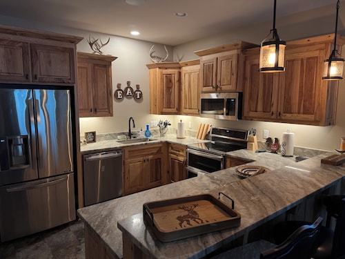 Charming Barndominium sits on 20 acres in Lonoke, AR.