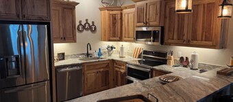 Charming Barndominium sits on 20 acres in Lonoke, AR.