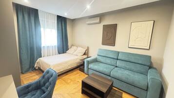 Deluxe Apartment, 2 Bedrooms, Balcony, River View | Iron/ironing board, free WiFi