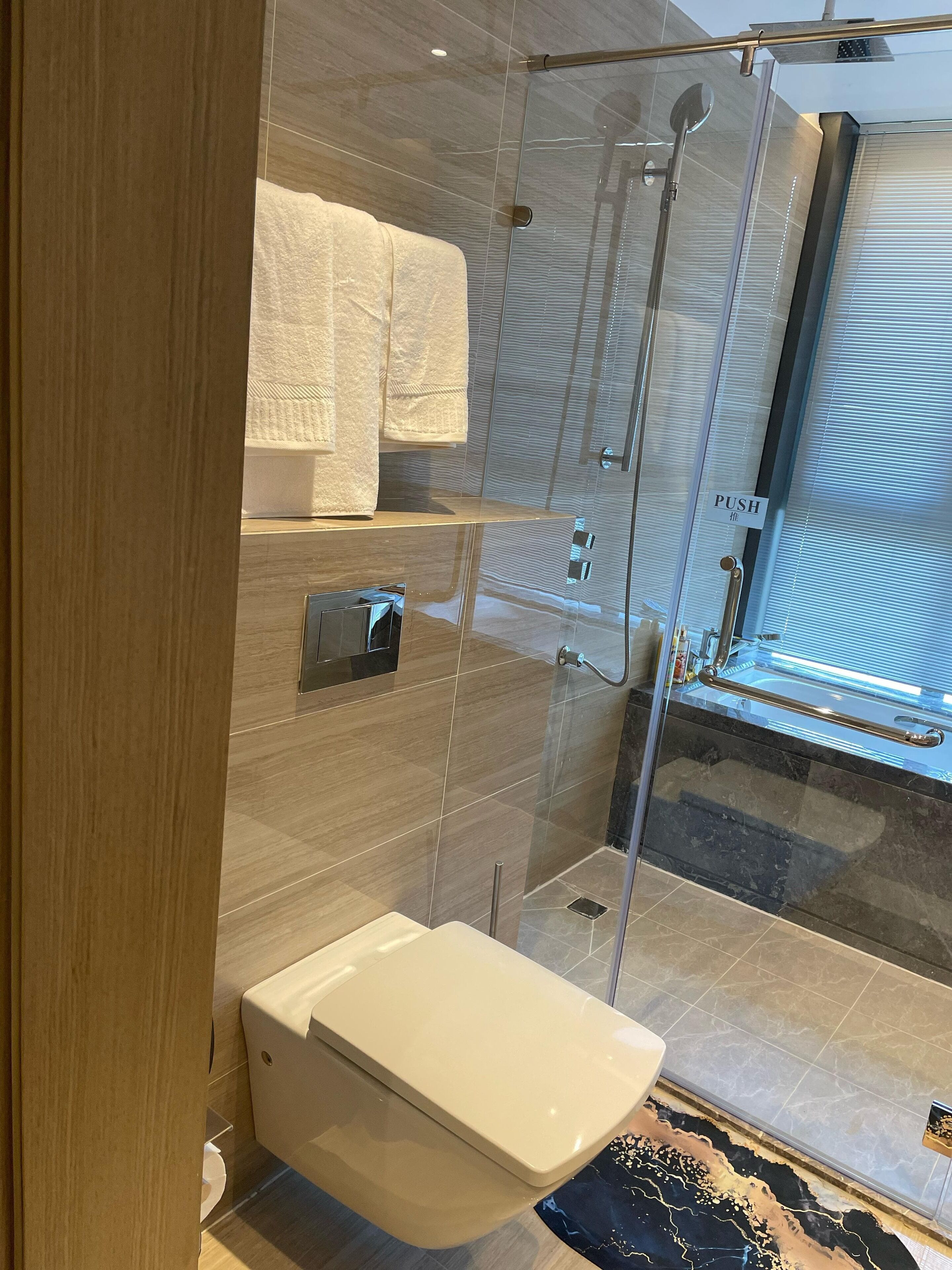 Shower, towels, soap, toilet paper