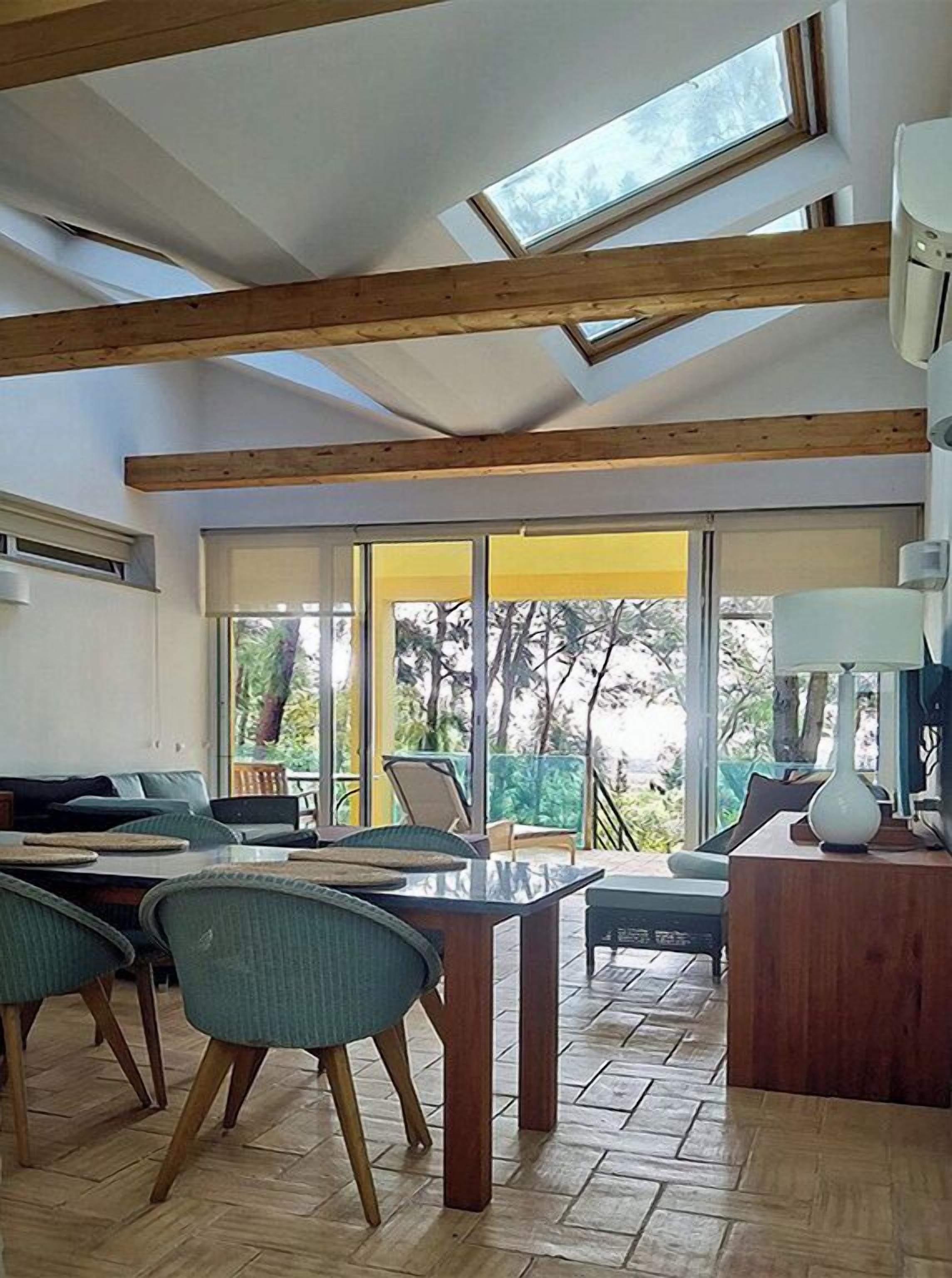 Departamento Deluxe, vista al océano | Área de sala de estar