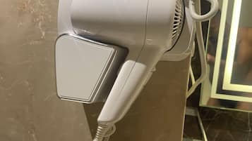 Hair dryer, slippers, towels