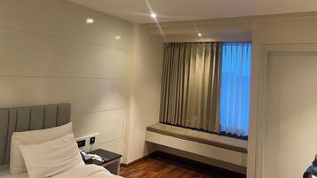 In-room safe, desk, blackout curtains, soundproofing
