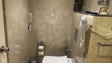 Hair dryer, slippers, towels